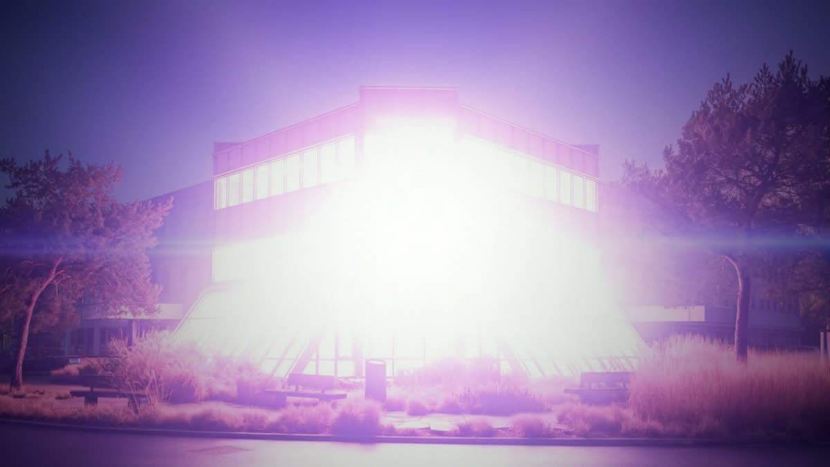 The same building flooded with white-violet light as it dissolves, a moment before the logo appears.